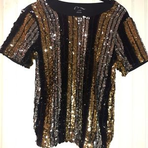 Soft on the inside sequins on the outside blouse